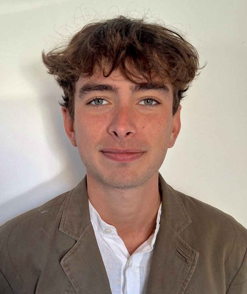 Thomas Rowe headshot Portrait of Thomas Rowe, web designer and digital marketing specialist, smiling and looking relaxed.